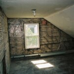 The "cat pee" room with plaster removed from the walls. Still, the stench prevailed.