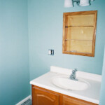 Upstairs bathroom. I built the medicine cabinet using some leftover pieces of the red oak flooring -- how's that for recycling?
