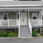 Since I couldn't find a manufactured sidelight that fit the space we had available, I built one, which you can see partially obscured by a porch post.